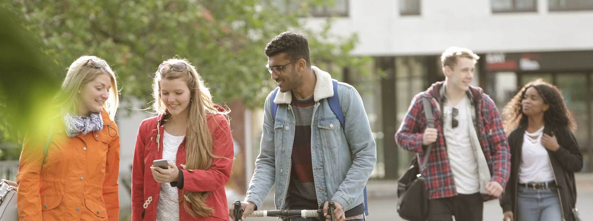 group of students walking through town