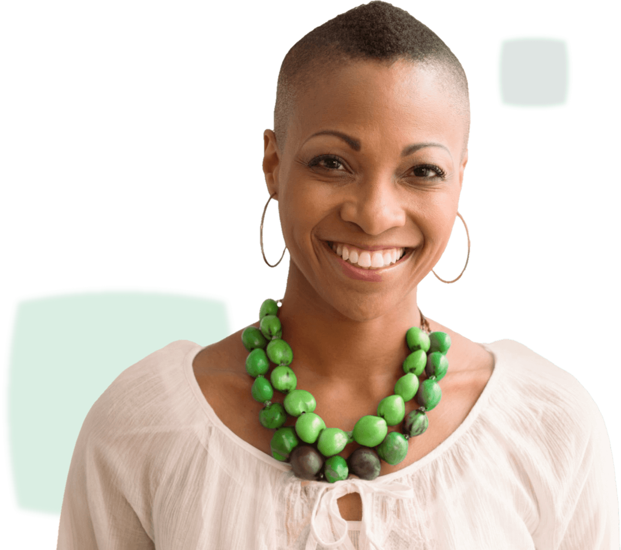 smiling lady with green necklace